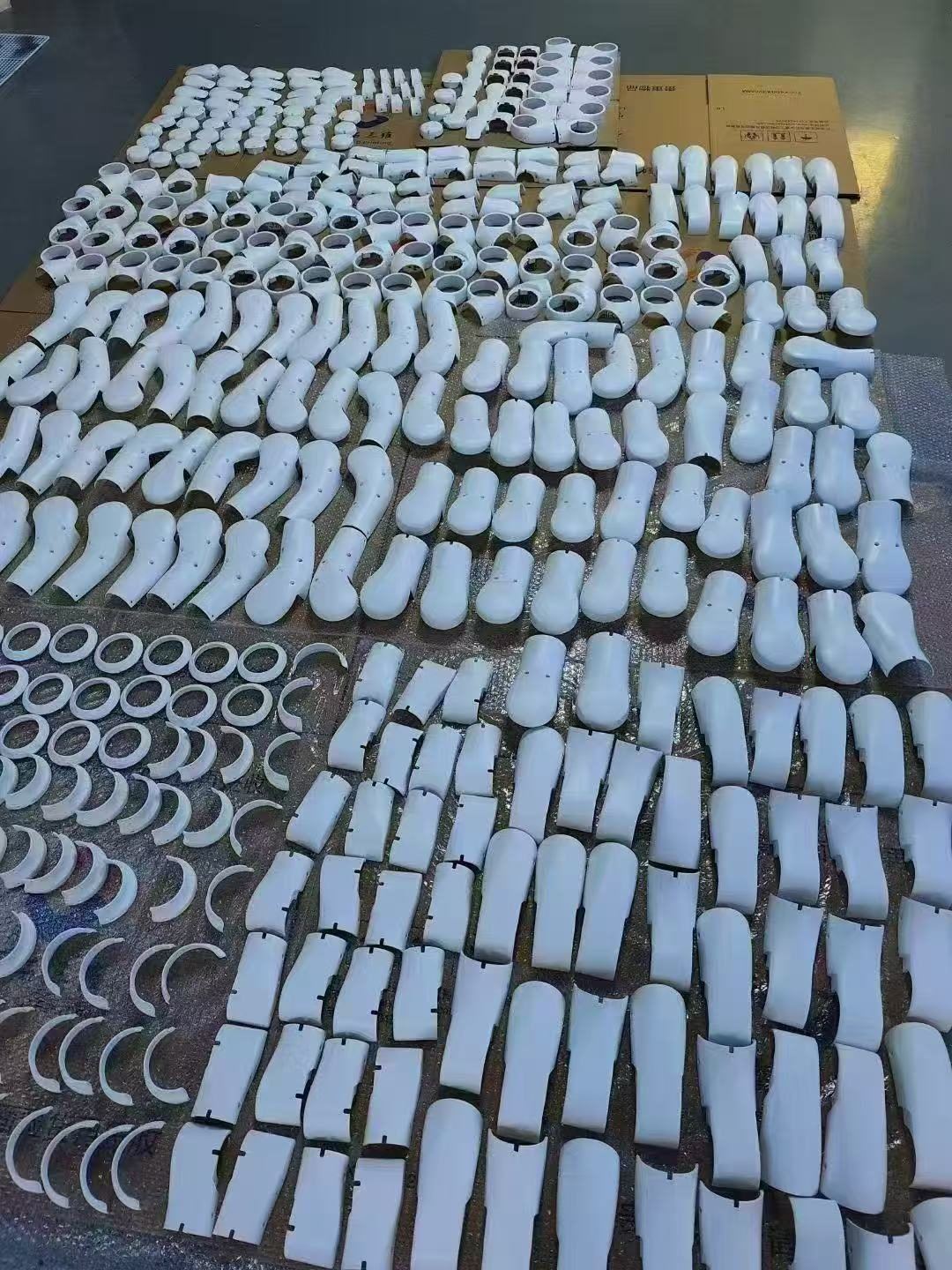 Finished covers staged at batch scale